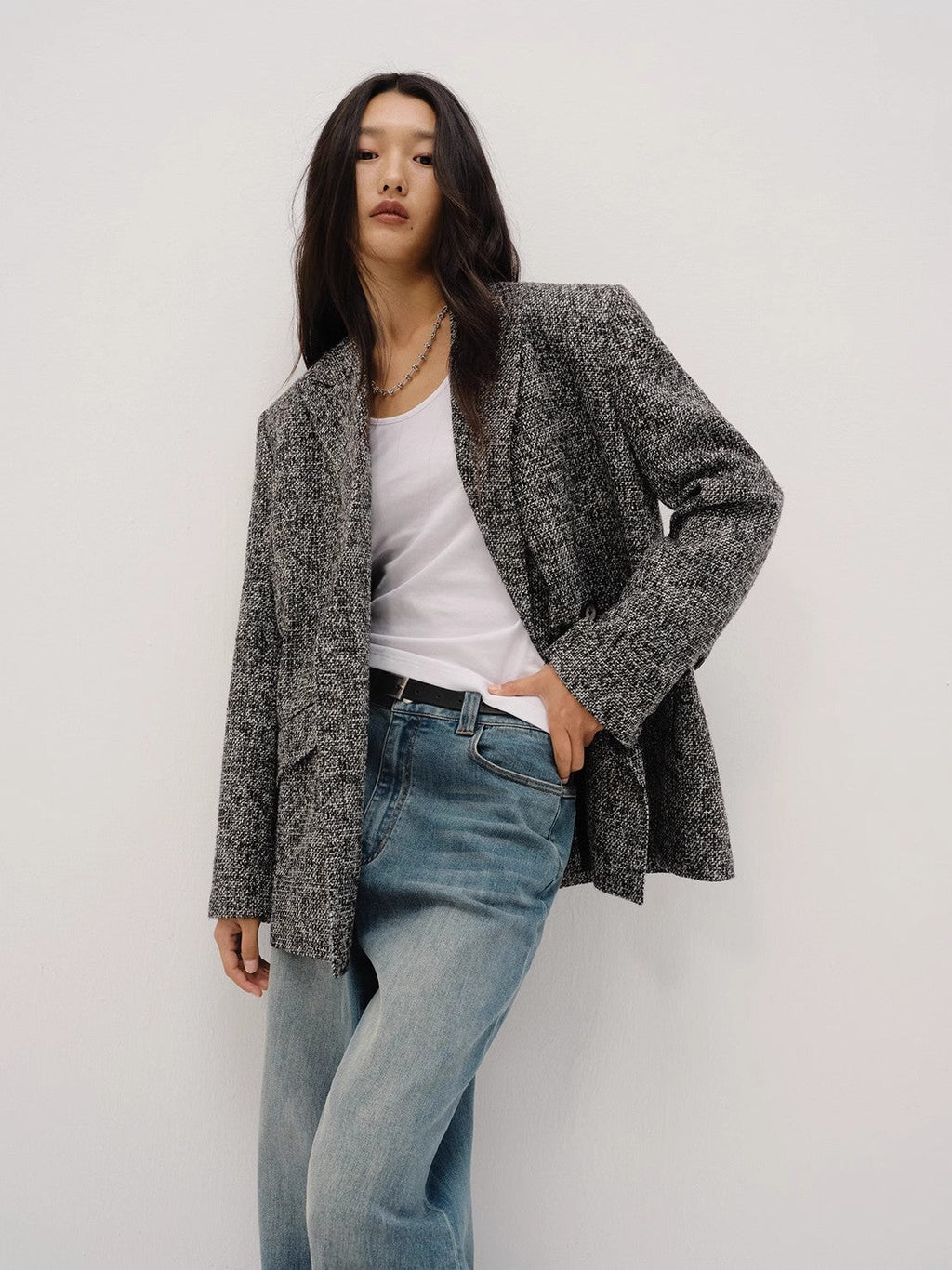 "Long Night Meteor" tweed blazer worn open over a white tee — three-quarter view