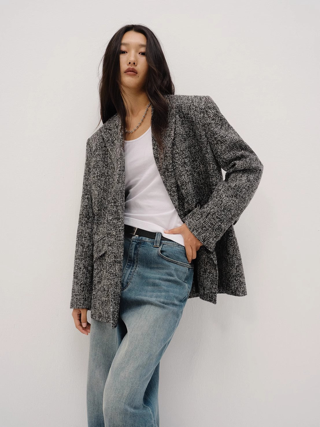"Long Night Meteor" tweed blazer worn open over a white tee — three-quarter view