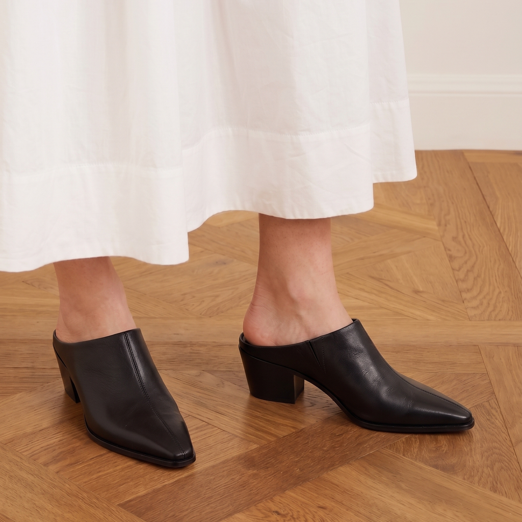 Carla Leather Western Mules in black — styled on model