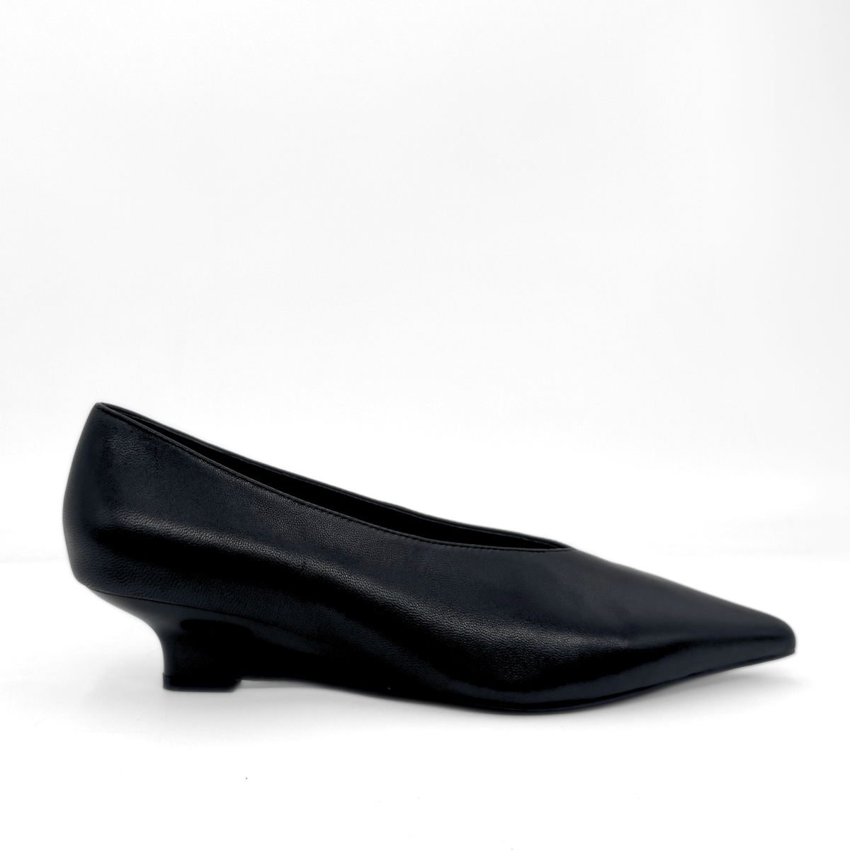 JoJo Leather Wedge Pumps in black — side view