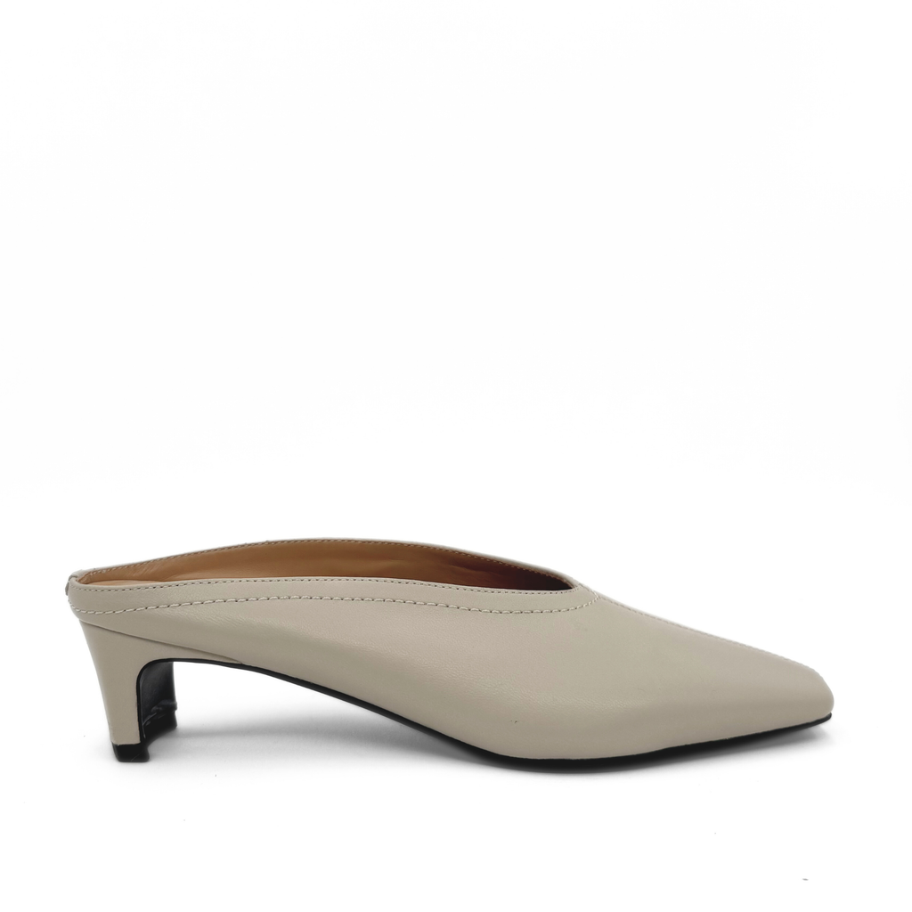 Junie Heeled Leather Mule in bone — side view