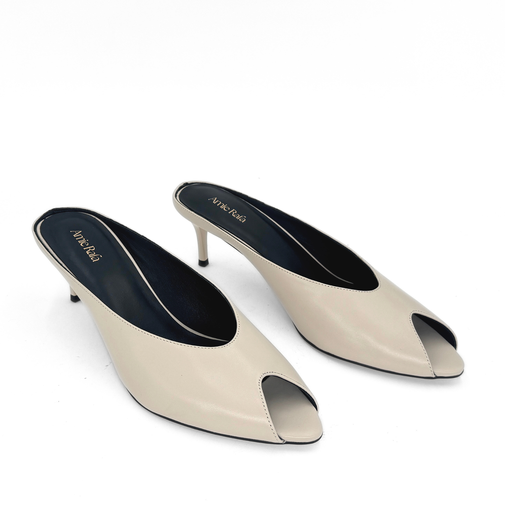 Audrey II Peeptoe Leather Mule in bone — pair, angled view