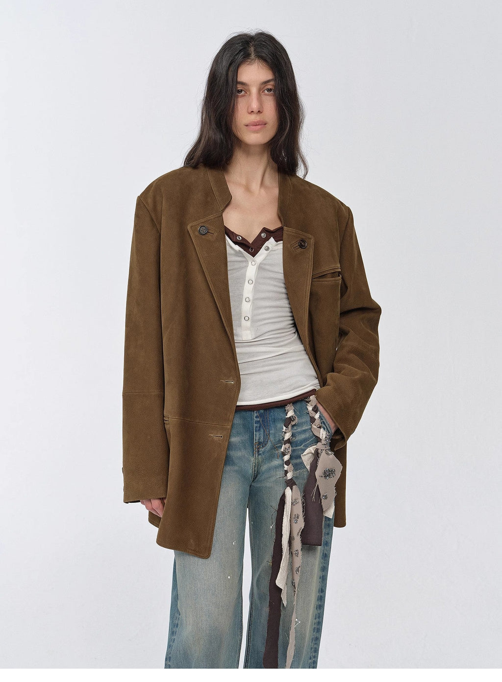 "Bavaria" brown suede leather blazer worn open over a tank top, three-quarter view
