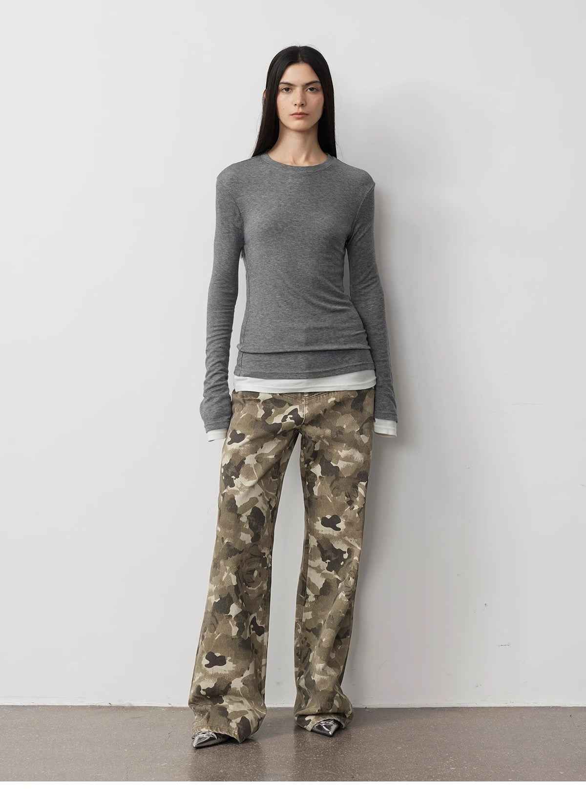 "Camouflage Charm" washed camo jeans with a grey knit top, front view