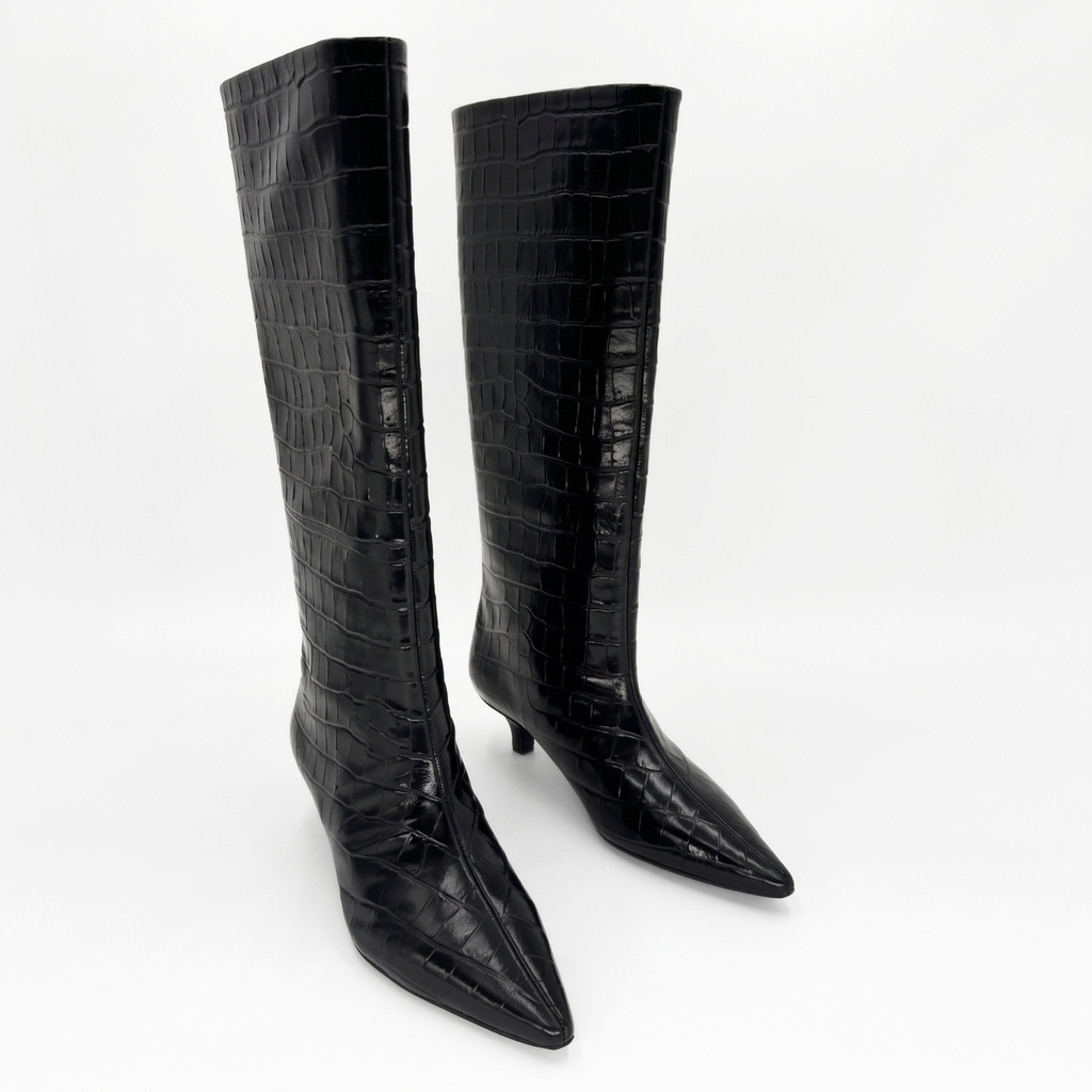 Ari Knee-High Glossed Leather Boots in black croc — pair, angled view