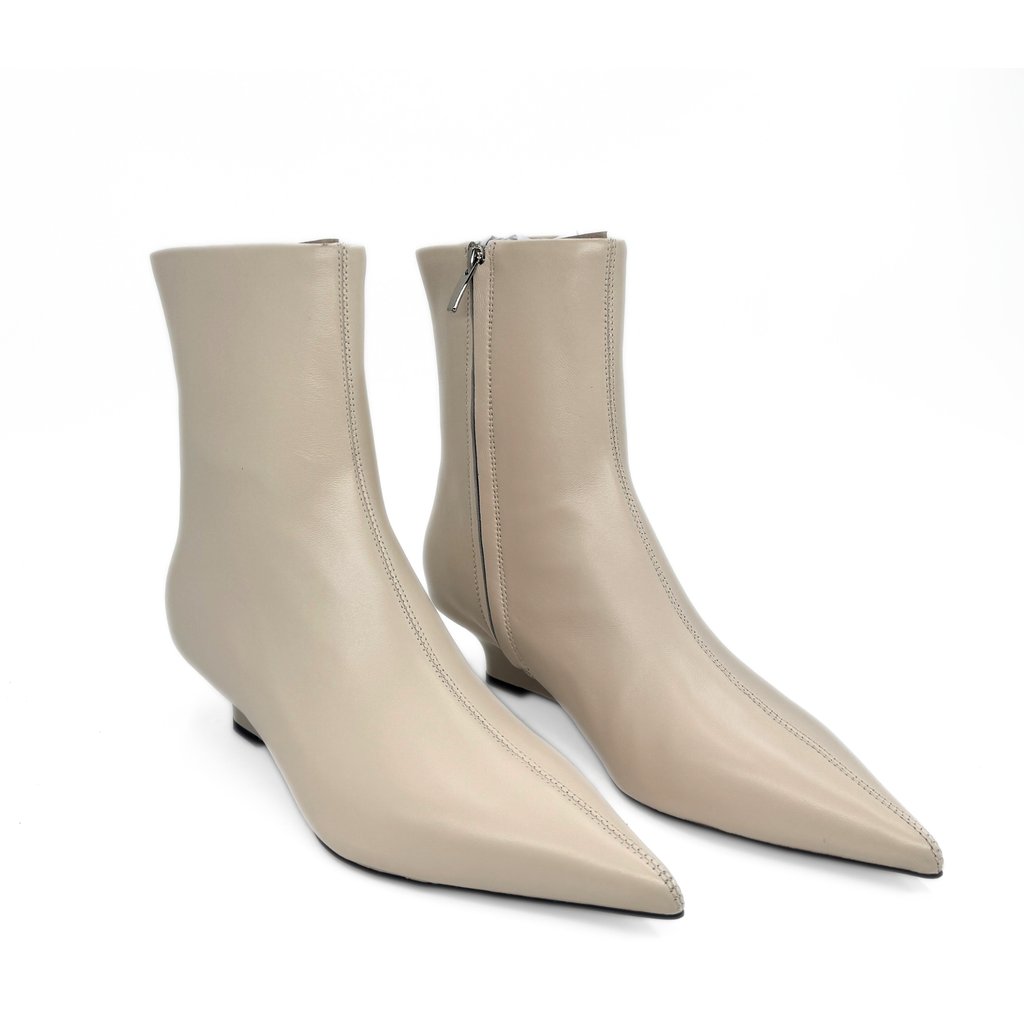 Jody Leather Wedge Boots in bone — pair, angled view
