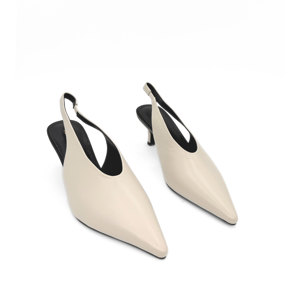 Alix Slingback Pumps in bone — pair, angled view
