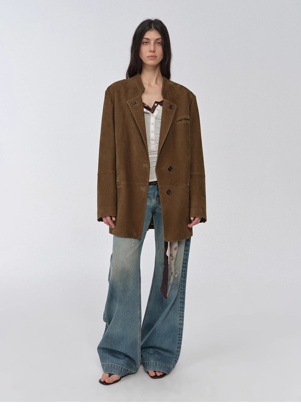 "Bavaria" brown vintage suede and waxed goatskin leather blazer with wide-leg jeans, full-length front view