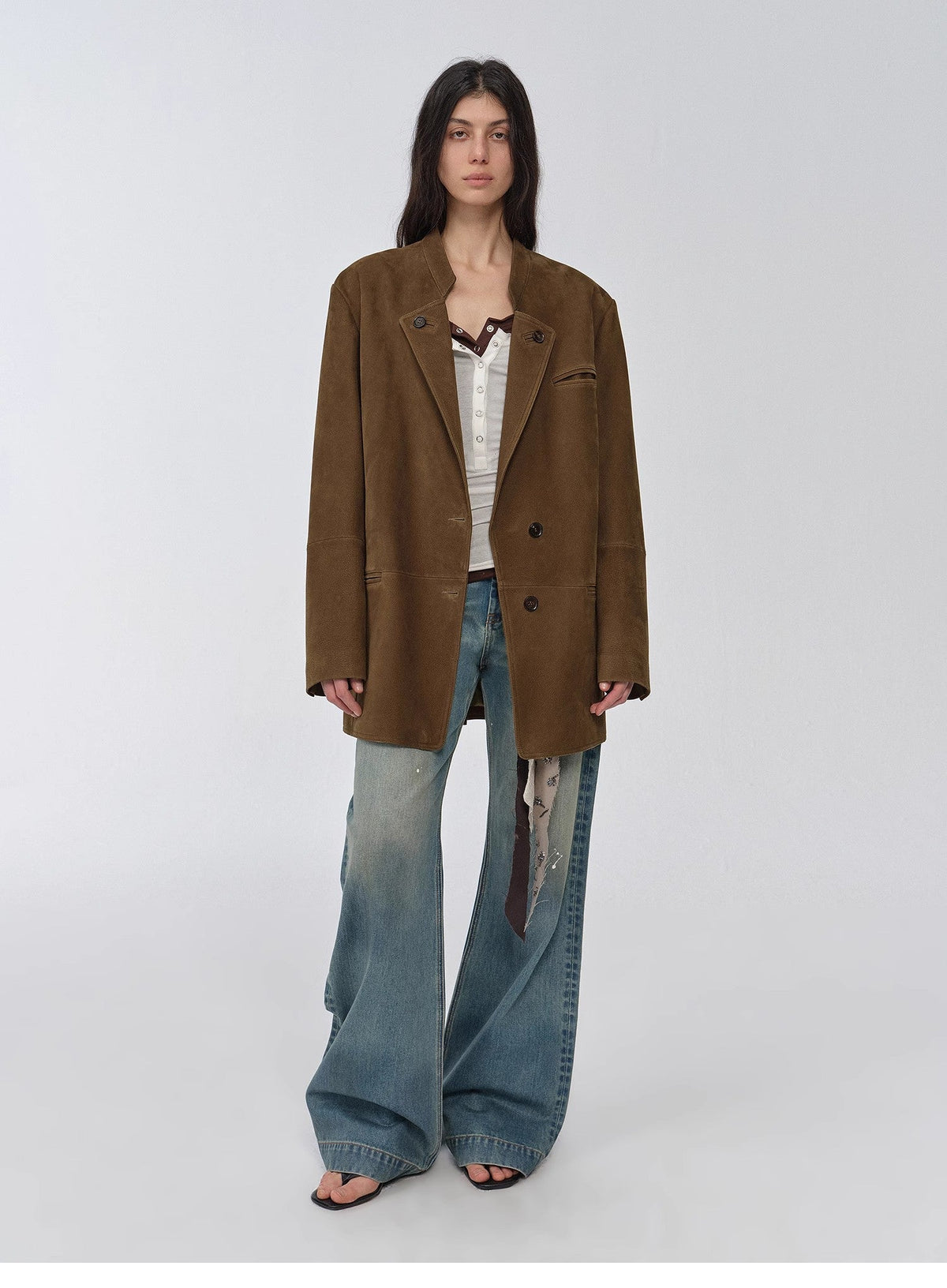 "Bavaria" brown vintage suede and waxed goatskin leather blazer with wide-leg jeans, full-length front view