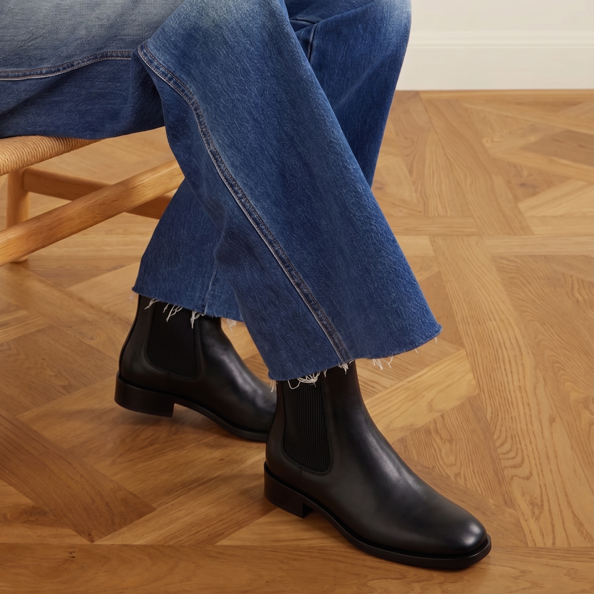 Cori Leather Chelsea Boots in black — styled on model