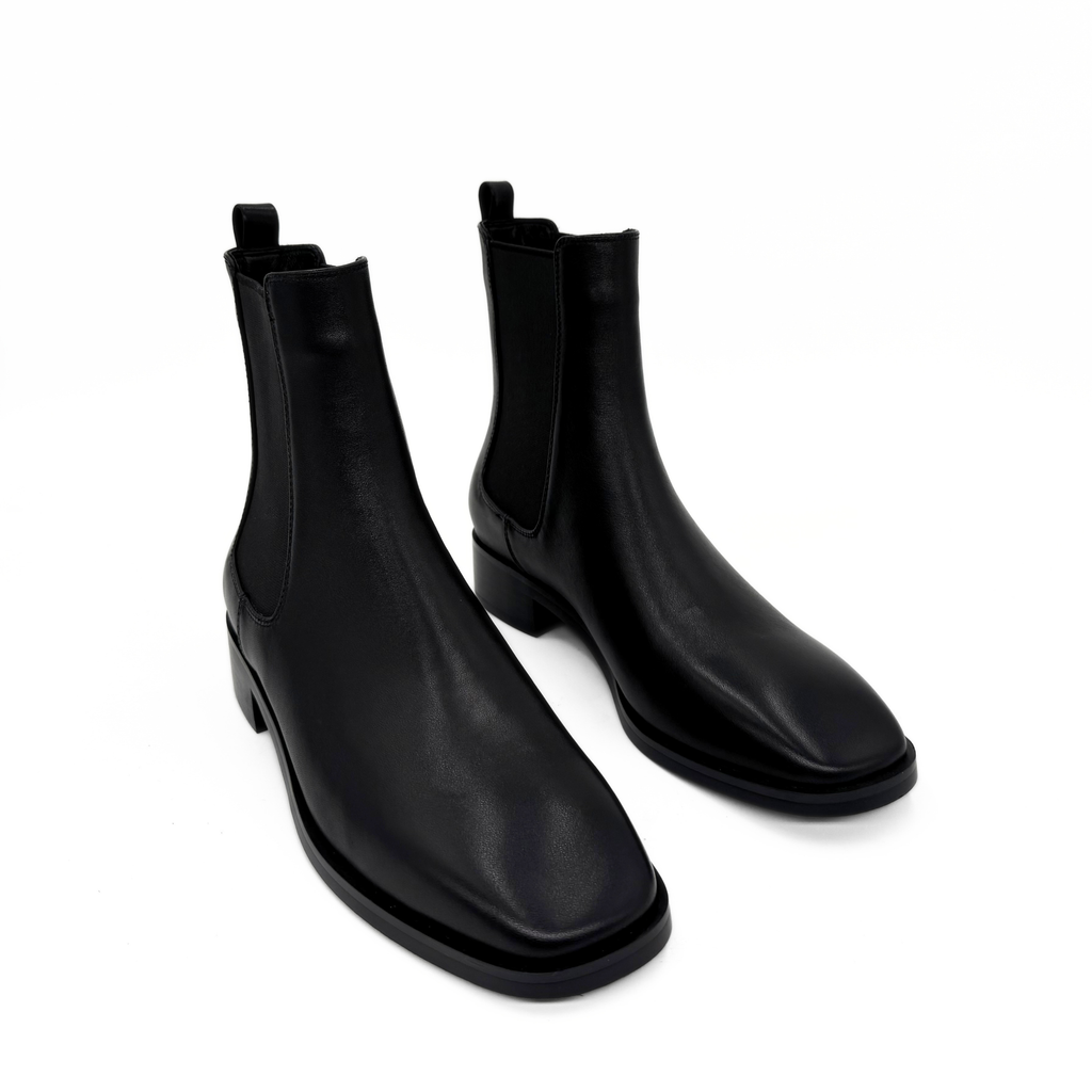 Cori Leather Chelsea Boots in black — pair, angled view