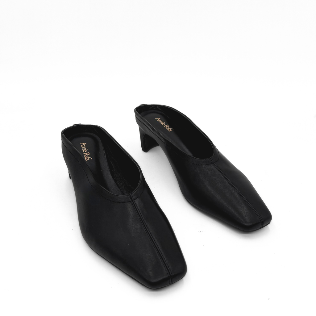 Junie Heeled Leather Mule in black — pair, angled view