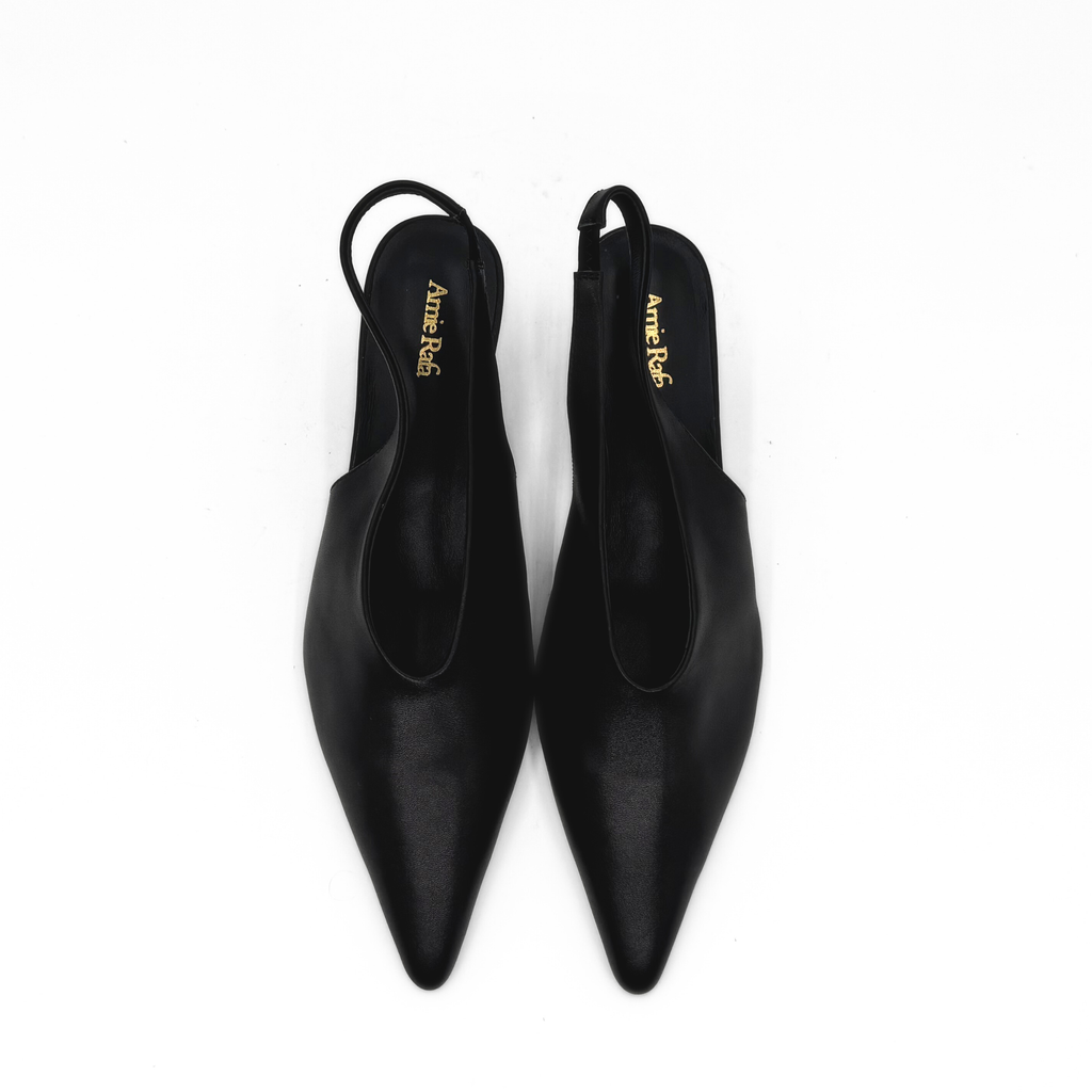 Alix Slingback Pumps in black — pair, angled view
