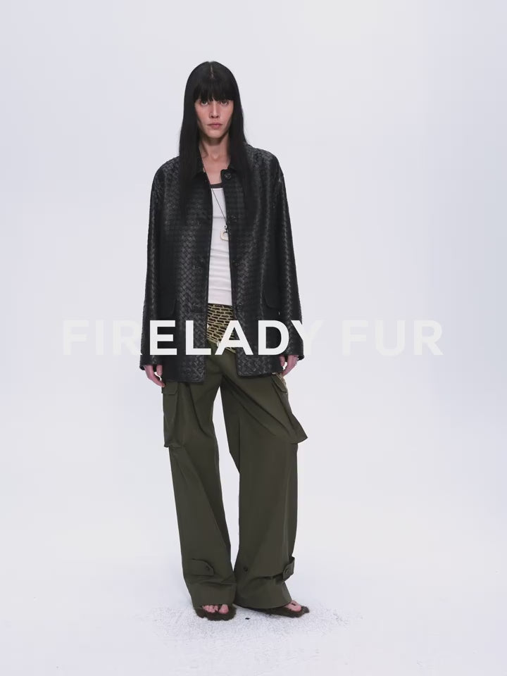 "Rembrandt Night" black woven lambskin jacket with olive cargo pants, three-quarter view